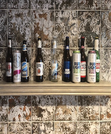 beer bottles on a shelf